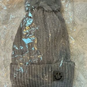Gray Knit Winter Hat with Pom Pom and Decorative Patch